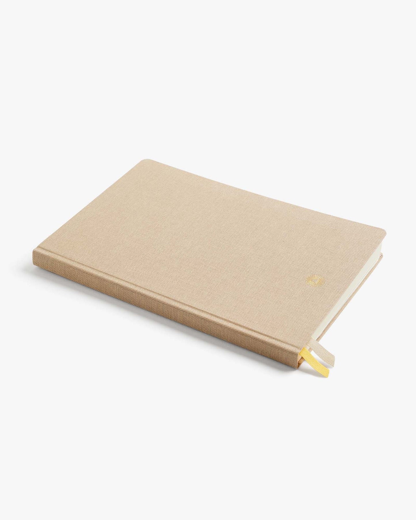 Beige notebook on a white background
