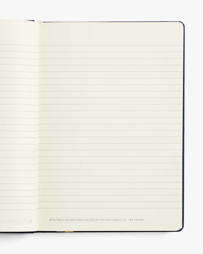 Open notebook with lined pages on a white background