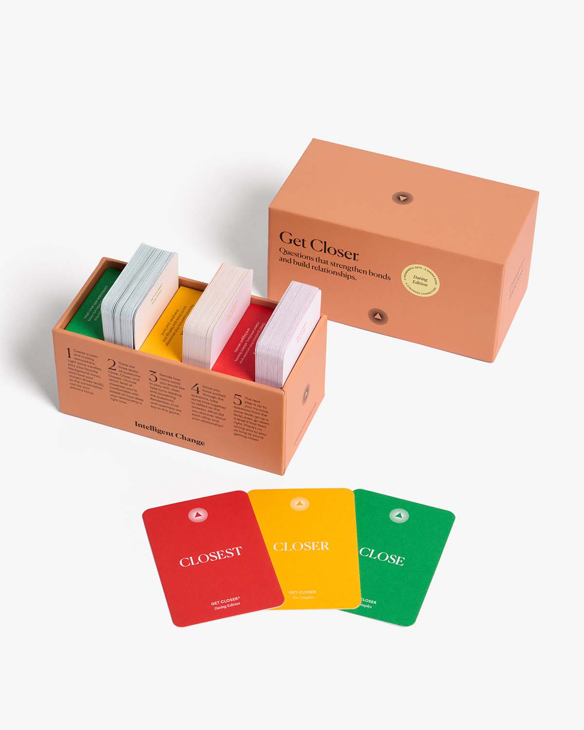 Color swatch cards with 'Closest', 'Closer', and 'Close' labels in a cardboard box on a white background.