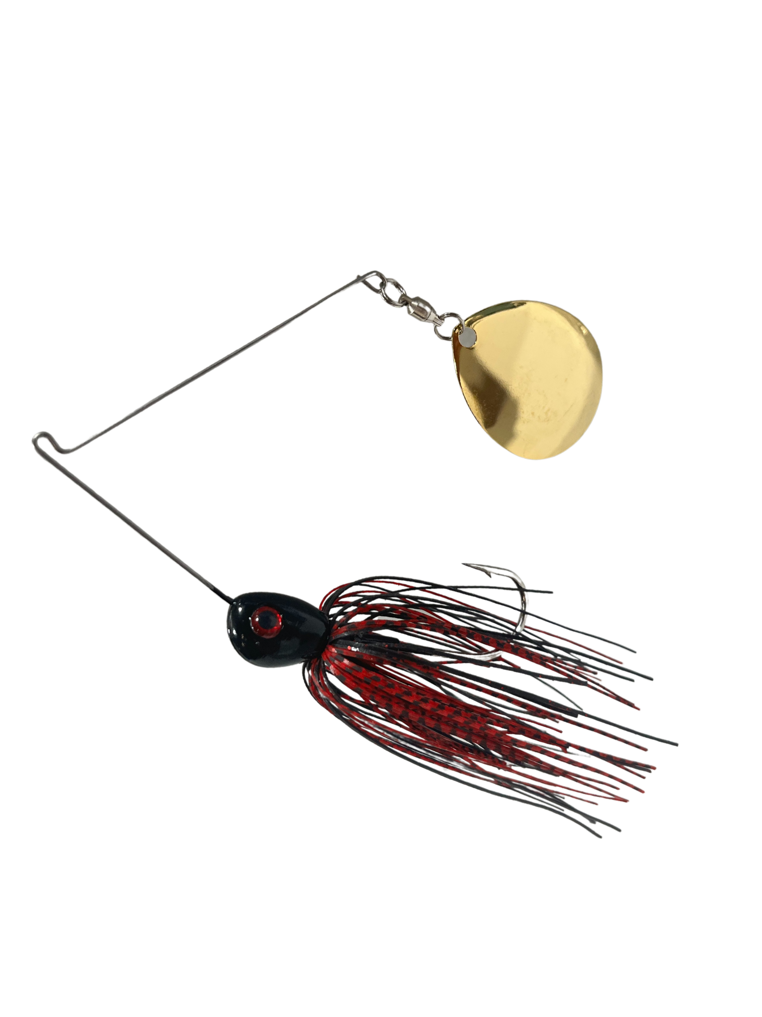 Fishing lure with gold blade and red and black skirt on a white background