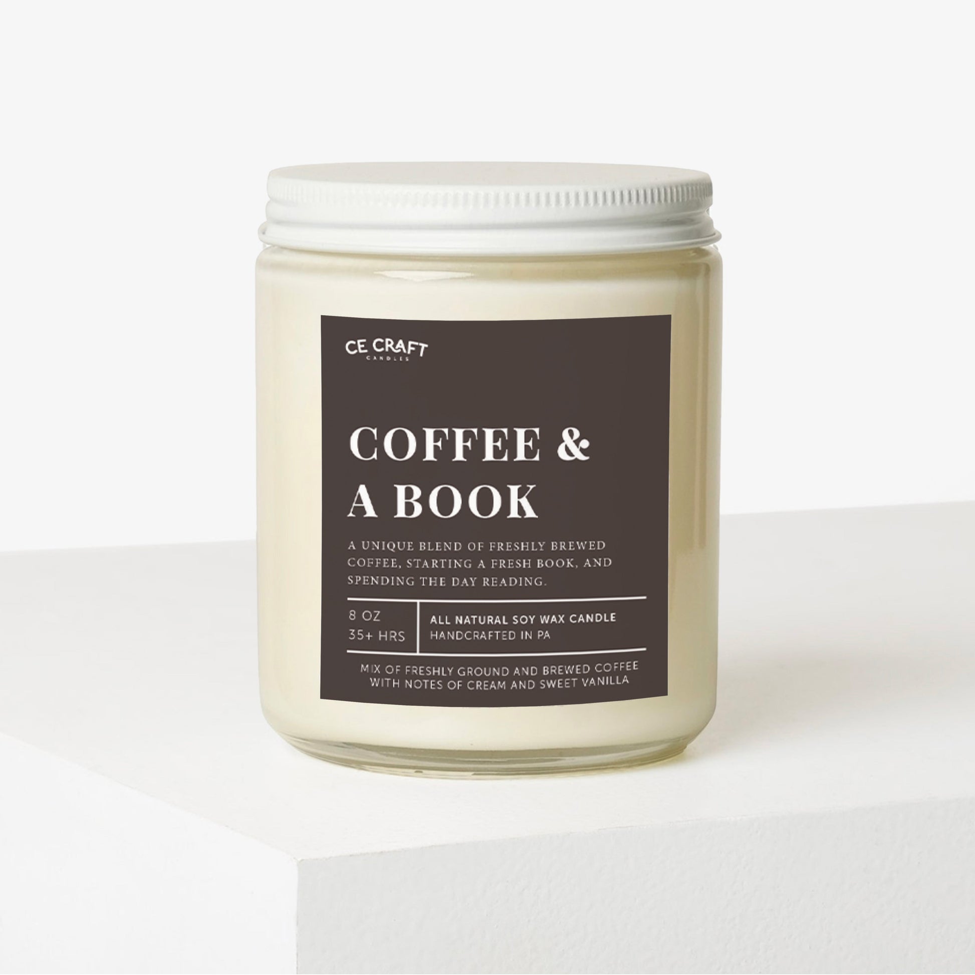 Candle jar labeled 'Coffee & A Book' by CE Craft on a white background