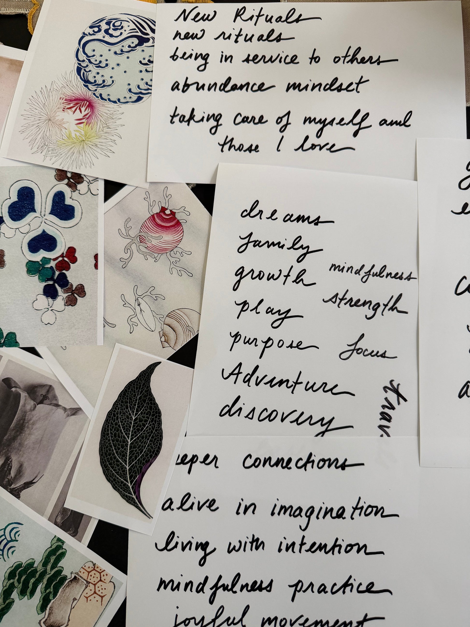 Handwritten text on a collage of cards with various designs
