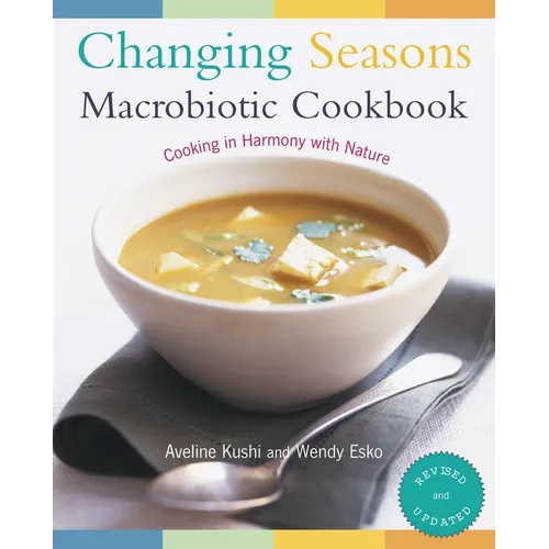 Book cover of 'Changing Seasons Macrobiotic Cookbook' with a bowl of soup and spoon on a white background.
