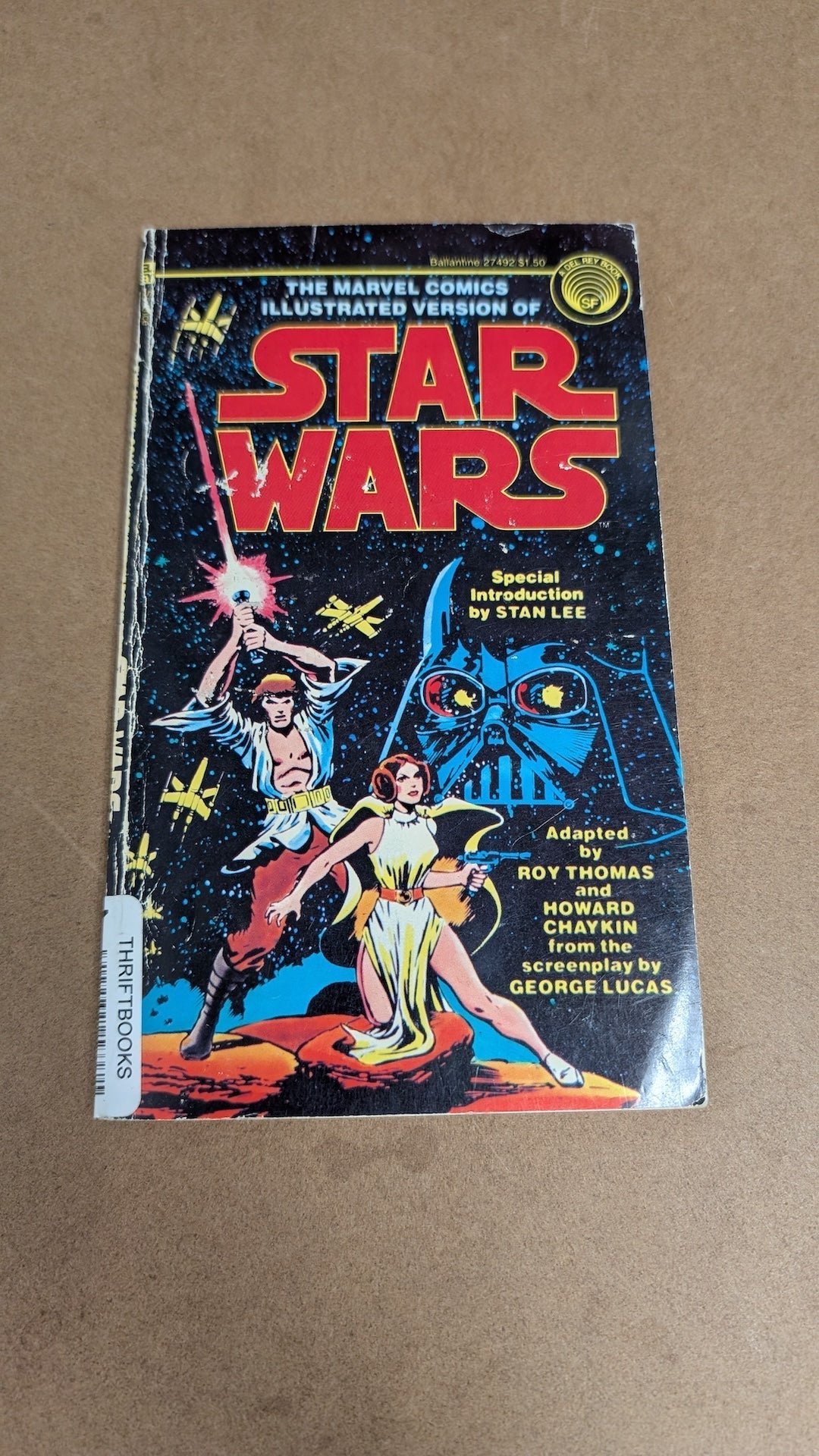 Vintage 'Star Wars' comic book cover on a brown background
