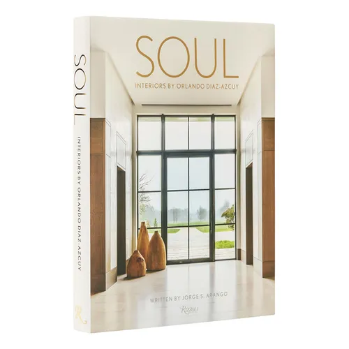 Book titled 'Soul Interiors by Orlandoe Azco' with a modern interior design cover.