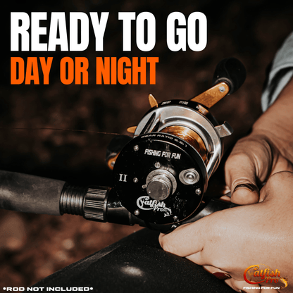Fishing reel held by a hand with text 'Ready to go day or night' on a dark background