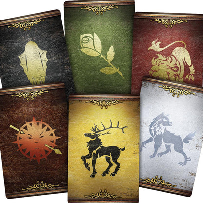 Set of six books with embossed symbols on their covers, resembling house sigils from a fantasy series.
